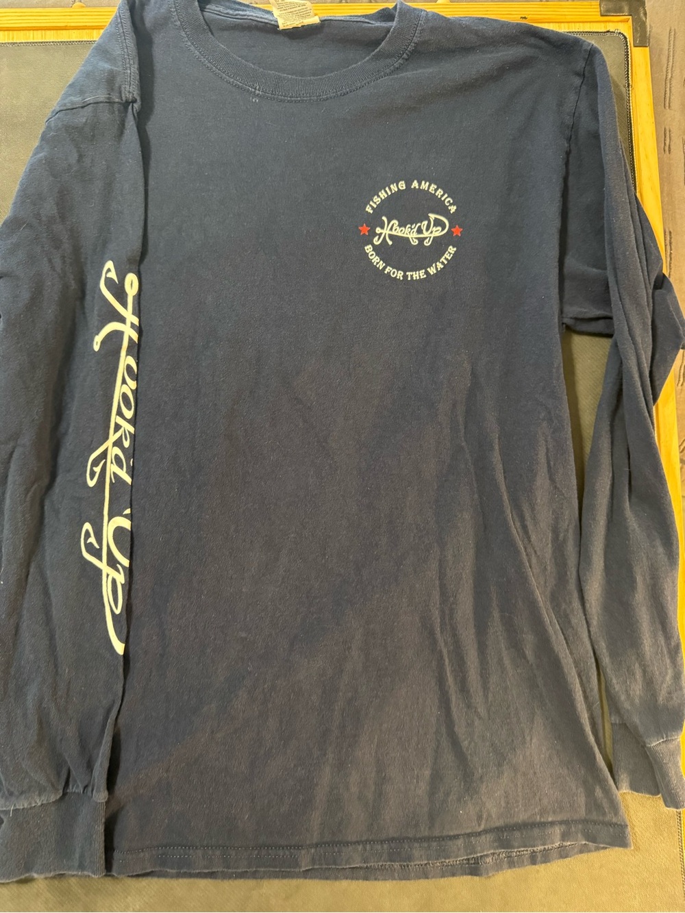 Hooked Up by IOT Navy Long Sleeve Graphic Tee with White Script